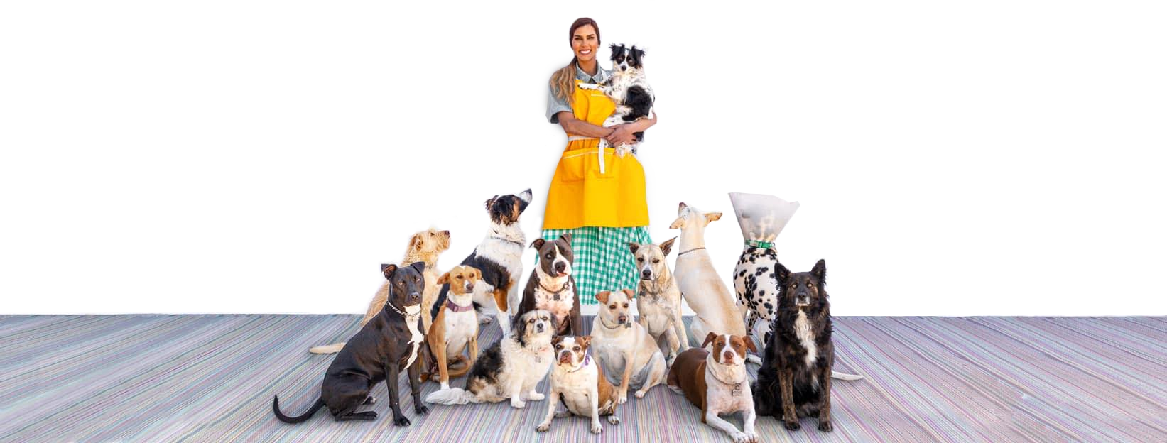 Dulce Vida Animal Rescue founder, Tati holding a dog in her arms