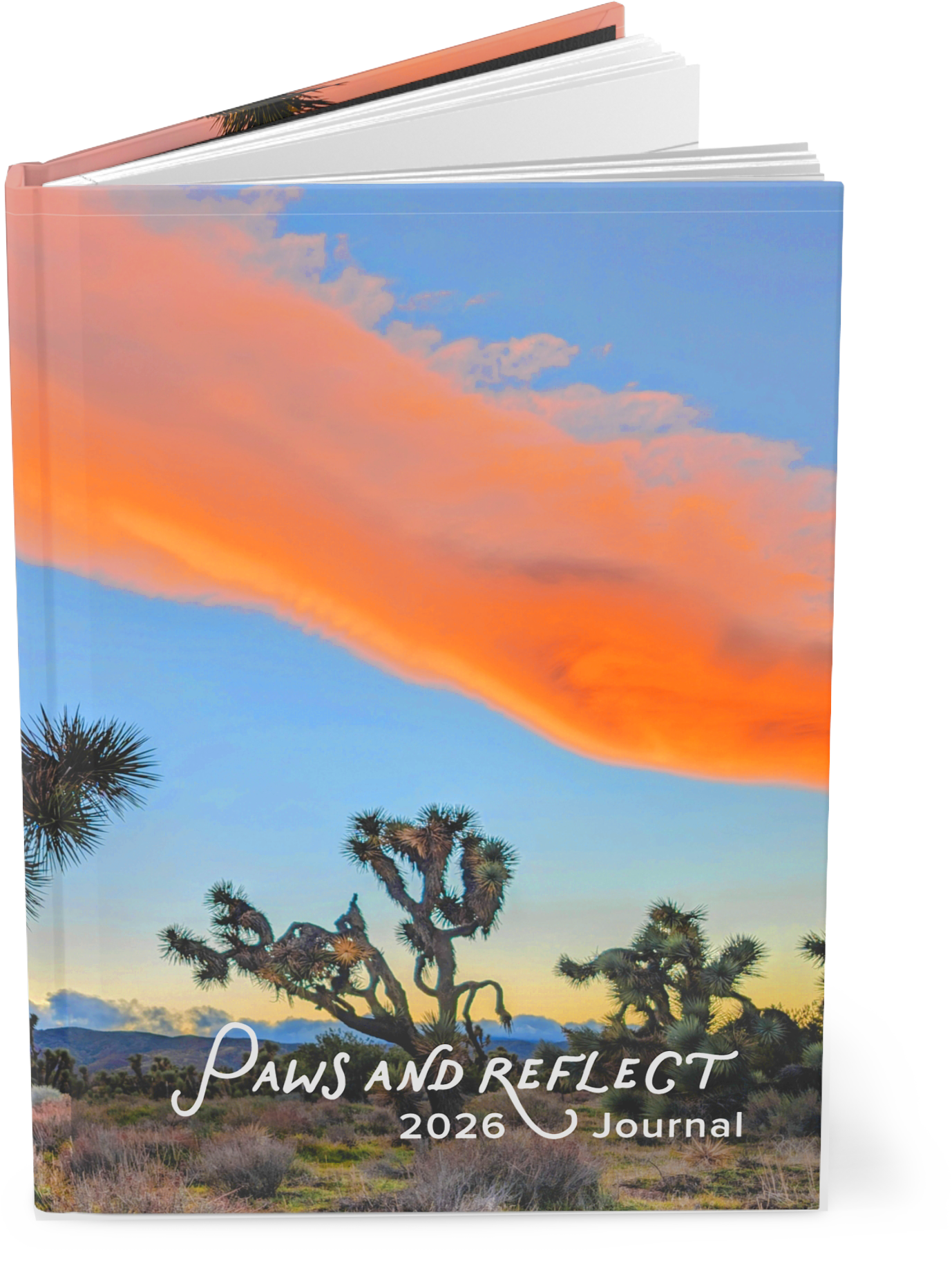 Lancaster art journal with a sunset view of joshua trees and red colored clouds